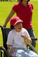 A disabled girl in a wheelchair.