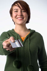 Girl holding credit card